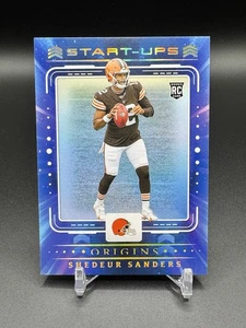 2025 Panini Origins Shedeur Sanders Start-up #15 RC - Foto 1 di 2