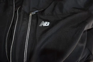 NewBalance schwarz med. gefütterte Herren Windjacke 4 Taschen RN130893 - Bild 1 von 13