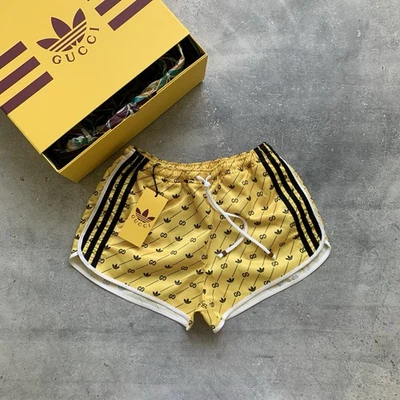 ADIDAS x GUCCI TREFOIL GG LOGO YELLOW NYLON SHORTS WOMEN'S SIZE M - Image 1 of 4