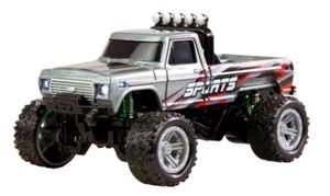 RC-MONSTER TRUCK DIE CAST 1:64 RTR CARROZZERIA METALLO ILLUMINAZIONE LED NOVITÀ 2025 - Foto 1 di 6