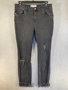 Pantalones de mezclilla para mujer Free People 29 negros con flecos ásperos dobladillo elástico desgastado - Imagen 1 de 16