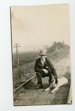 Man with pet dog on railway tracks   Vintage snapshot found animal photo 