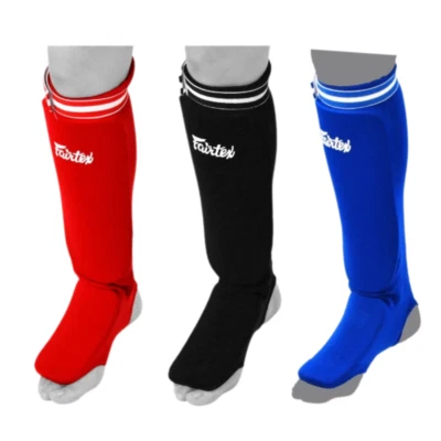 Espinilleras elásticas Fairtex de competición Muay Thai boxeo almohadillas de combate tamaño libre Foto 1 de 4