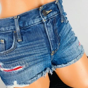 Abercrombie & Fitch Jean Shorts Jean Shorts Red Patch Accents Fringe Hem 2 W 26 - Picture 1 of 6