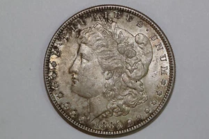 Grades About Uncirculated 1885 P Morgan 90% Silver Dollar (MDX2078) - Picture 1 of 10