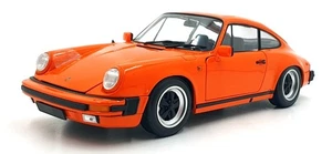 Minichamps 1/18 Scale 100 063025 1983 Porsche 911 Carrera Coupe 3.2 - Orange - Picture 1 of 5