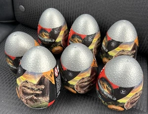 7 x Jurassic World Rebirth Captive Build & Battle Small Dino Eggs with Slime - Picture 1 of 3