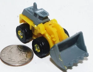 Sehr kleiner Mini Micro Tonka Schwerlastlader in gelb & grau - Bild 1 von 4