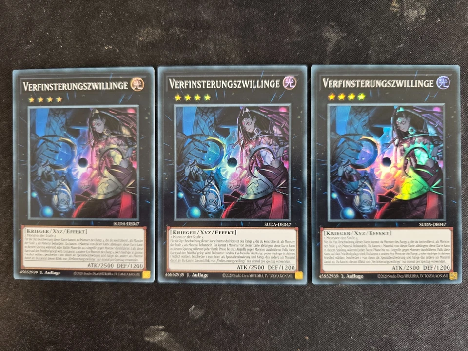 3x Yu-Gi-Oh! SUDA-DE047 Verfinsterungszwillinge Super Rare NM 1st - Bild 1 von 1