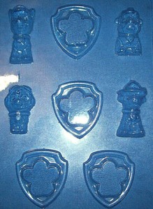 FOUR PAW PATROL CHARACTERS AND FOUR SHIELDS CHOCOLATE MOULD OR PLASTER MOULD