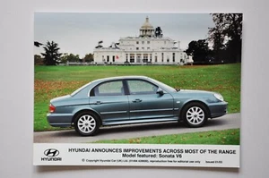 Foto de prensa de coche - Hyundai Sonata V6 2003 - azul claro/gris - vista lateral - Imagen 1 de 1