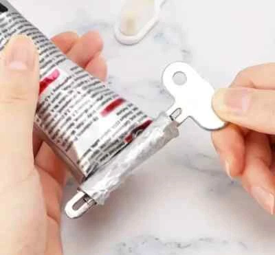 Metal Toothpaste Tube Squeezer Dispenser Roller Cream Press Dental Bathroom Tool - Image 1 of 4