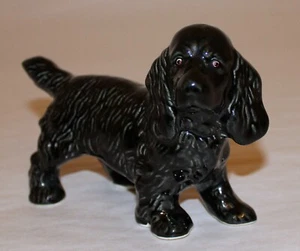 Estatuilla de porcelana negra perro terrier 6" largo 4" alto - Imagen 1 de 6