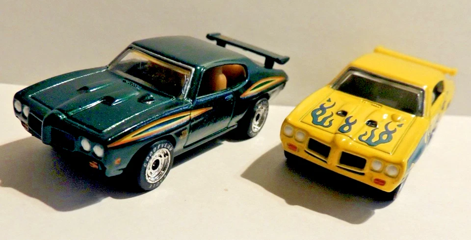 Matchbox Premiere~ ’70 Pontiac GTO Duo w/GoodYear RR’s~2 loose/mint-new GTO's - Image 1 of 4