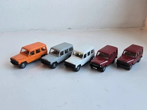 WIKING 5x Mercedes Benz G-Klasse 230G 266 weiß silbergrau rubinrot rotorange - Bild 1 von 6