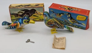2 Vtg Kohler Mechanical Wind Up Litho Toys Crow & Singing Jubilating Bird Boxes - Picture 1 of 7