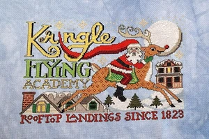 Fertig - Kringle Flying Academy Dachlandungen seit 1823 - Kreuzstich - Bild 1 von 3