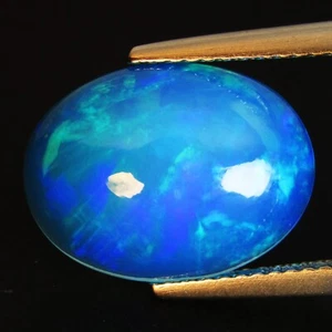 4.39Cts Natural Color Play Ethiopian Blue Opal Oval Cabochon Loose Gem VOD - Picture 1 of 5
