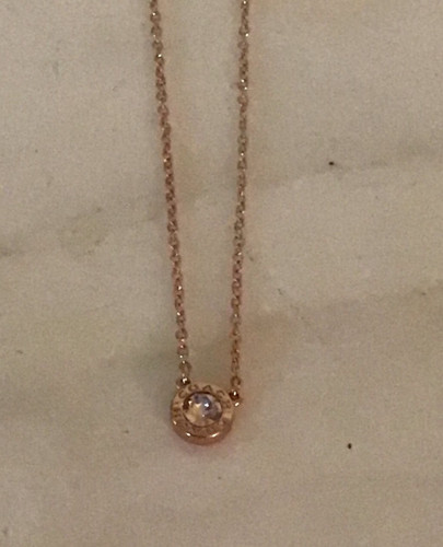 Collana Coach con pietre a cerchio aperto tono rosa