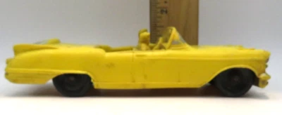 Coche de juguete vintage de goma castaño rojizo 1957 Cadillac convertible amarillo 5 3/4" años 60 Foto 1 de 4
