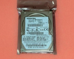 Disque dur pour ordinateur portable Toshiba 2,5" 40 Go 5400 tr/min 8 Mo cache IDE MK4032GAX - Photo 1/2