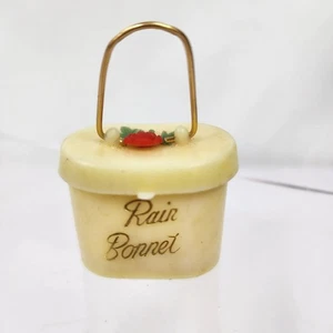 Cofano pioggia giallo vintage anni 50 in mini custodia plastica con rosa e manico intatto - Foto 1 di 4
