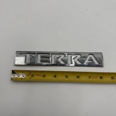 05 06 07 08 09 10 11 12 NISSAN XTERRA TERRA REAR EMBLEM LOGO BADGE SYMBOL OEM A1 - Image 1 of 2