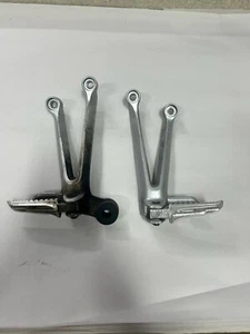 USED 05-06 Suzuki GSXR1000 GSXR 1000 OEM REAR FOOT PEGS AND BRACKETS - Picture 1 of 9
