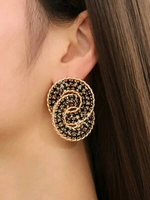 Pendientes circulares de cobre negro para mujer Foto 1 de 4