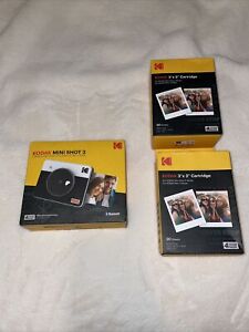 Kodak Mini Shot 3.  Digital Camera and Photo Printer (3X3) And 2 Cartidges