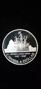 1987 Canadian 400th anniv of John Davis Exp 50% Silver Dollar - Picture 1 of 4