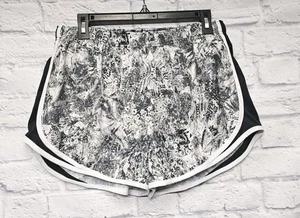 NIKE L MUJER DRI-FIT NEGRO GRIS MALLA FORRADO BOLSILLO CORDÓN PANTALONES CORTOS PARA CORRER - Imagen 1 de 19