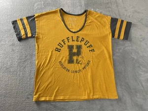 CAMISA HARRY POTTER AMARILLA MUJER HUFFLEPUFF TALLA PEQUEÑA CUELLO EN V SUELTA - Imagen 1 de 7