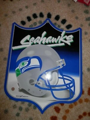 Escudo de letrero de pared Seattle Seahawks nuevo de colección aproximadamente 12.5" x 9.75" hombre cueva NFL Foto 1 de 4