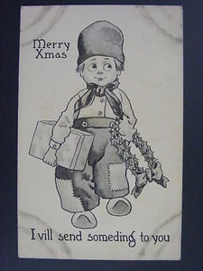 Niño holandés Feliz Navidad con regalo y corona postal antigua 1912 - Imagen 1 de 2