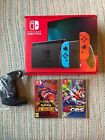 Nintendo Switch Console - Neon Blue/Red Controllers +Extra Pad Perfect Condition
