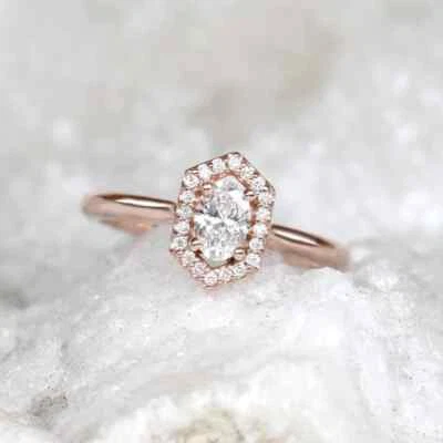 Anillo de compromiso nupcial solitario moissanita corte ovalado de 1 quilate oro rosa macizo de 14 quilates Foto 1 de 4