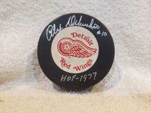 VINTAGE Alex Delvecchio HOF 77 AUTOGRAPHED Detroit Red Wings Trench Puck, NICE! - Picture 1 of 1