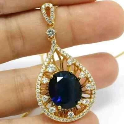 Colgante de belleza para mujer de zafiro creado en laboratorio de corte ovalado de 2 quilates enchapado en oro amarillo de 14 quilates Foto 1 de 4