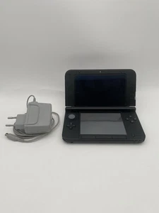 Nintendo 3DS XL Spielkonsole Silber/Schwarz - Touch Teildefekt - Bild 1 von 7