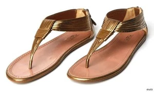 ALAIA bronce bronce cuero correa en T tanga sandalias cremallera zapatos planos nuevos $895 - Imagen 1 de 5