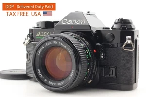 Duty-Free US【NEUWERTIG】Canon AE-1 Programm analoge Spiegelreflexkamera NEU FD 50mm f1.4 aus JAPAN - Bild 1 von 16