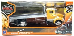NEW RAY PETERBILT 335 FLATBED LONG HAUL TRUCKER 1:43 SCALE - Picture 1 of 2