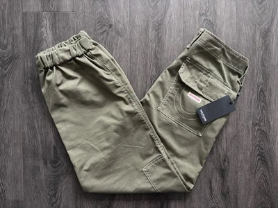 CALÇA JOGGER VAREJO US$ 199 TRUE Religion bobbi cargo folgada kalamata tamanho 28 - Imagem 1 de 4