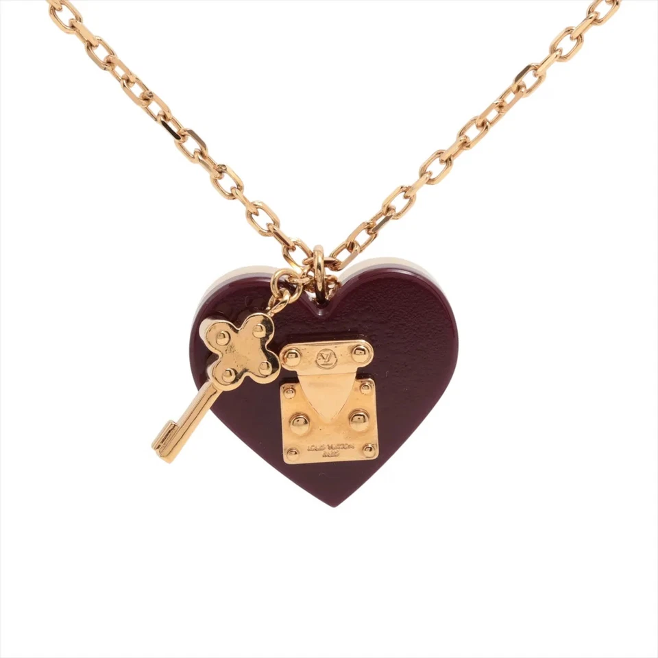 Collar Louis Vuitton M66516 Pandantif Lock Me LE1101 GP x resina oro Foto 1 de 4