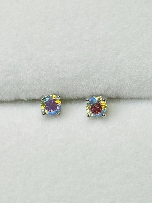Tiny 925 Sterling Silver .20 Total Carats Mystic Aura Moissanite Stud Earrings - Image 1 of 4