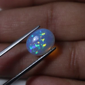10x12 MM Oval 2.7 Cts Natural AAA Rainbow Fire Welo Ethiopian Opal Cabochon - Picture 1 of 9