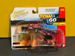 1/64 JOHNNY LIGHTNING TOW & GO 1979 INTERNATIONAL SCOUT II & UTILITY TRAILER - Picture 1 of 3