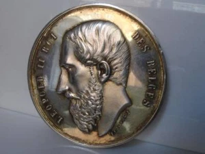 Pareja medallas conmemorativas. Leopoldo II. Bélgica. Plata y vermeil. 1896-1899 - Imagen 1 de 6