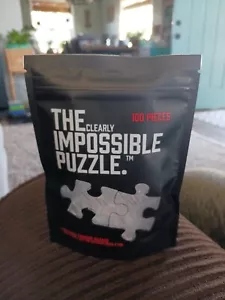 THE CLEARLY IMPOSSIBLE JIGSAW PUZZLE 100 PIECES CLEAR - Picture 1 of 3